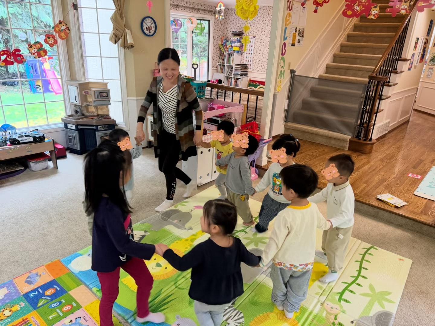 Panda Bear Childcare — teacher leading circle time with young children