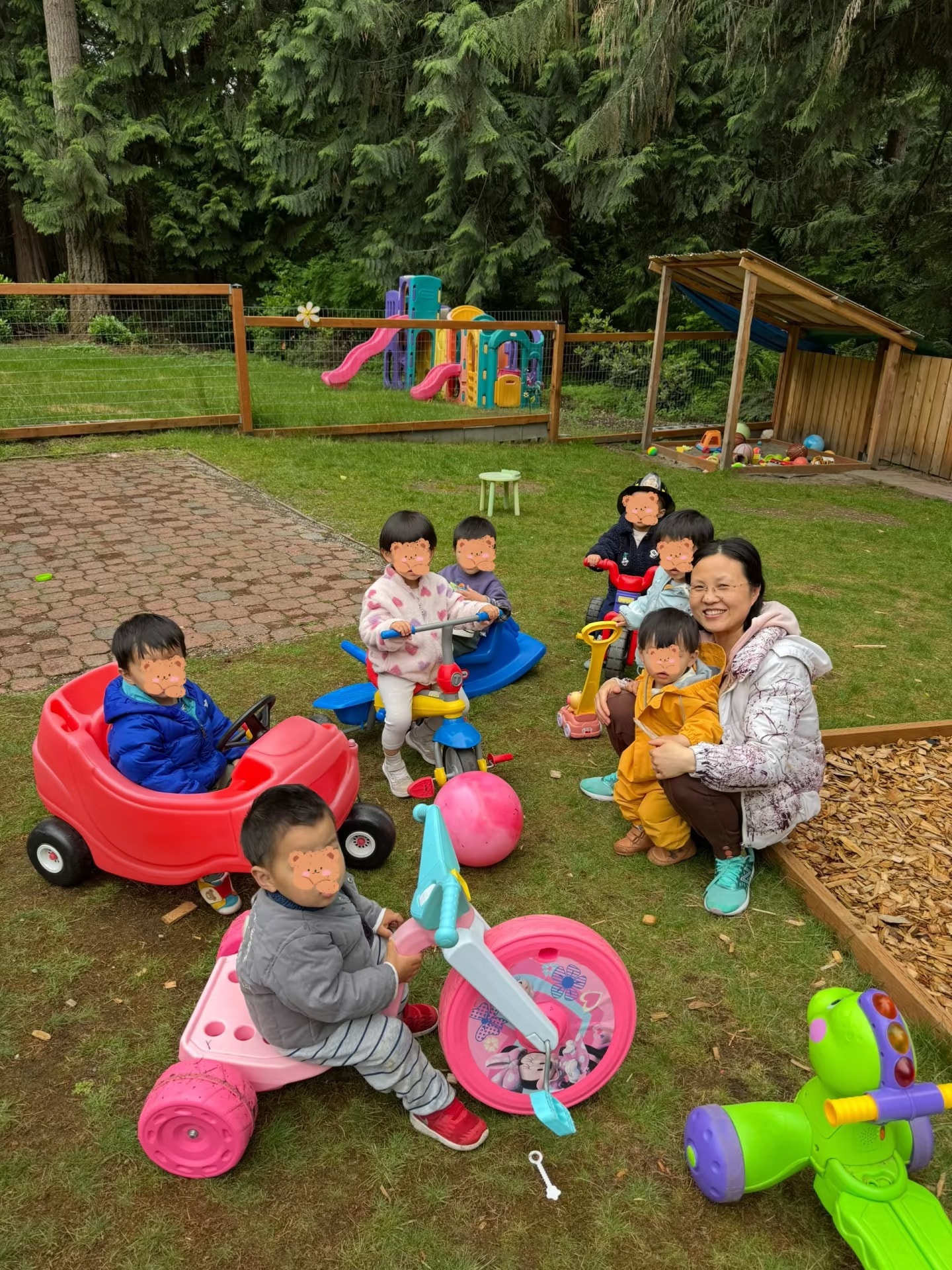 Panda Bear Childcare — toddlers playing outdoor daycare playground