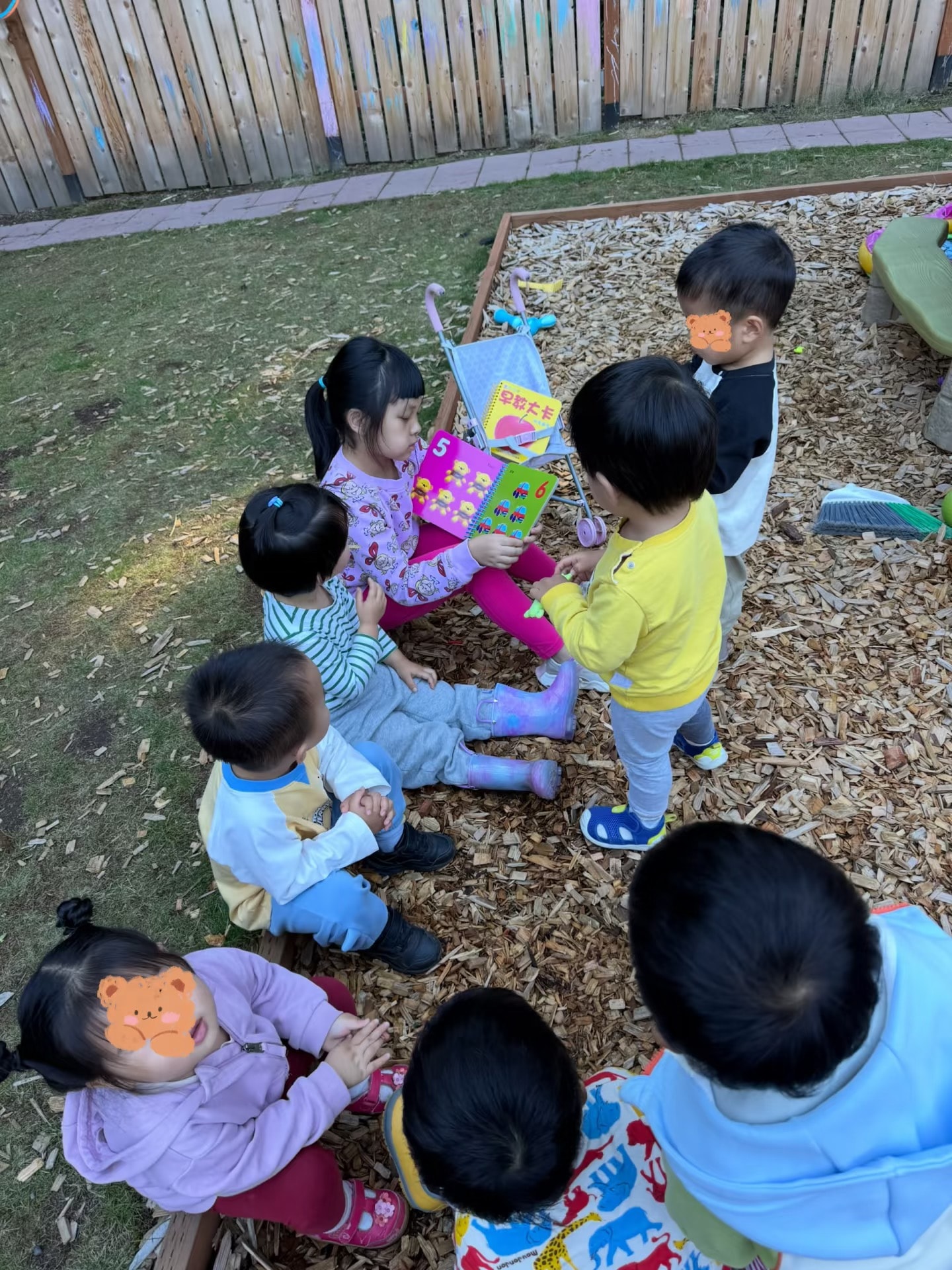 Panda Bear Childcare — young children playing together outdoor playground