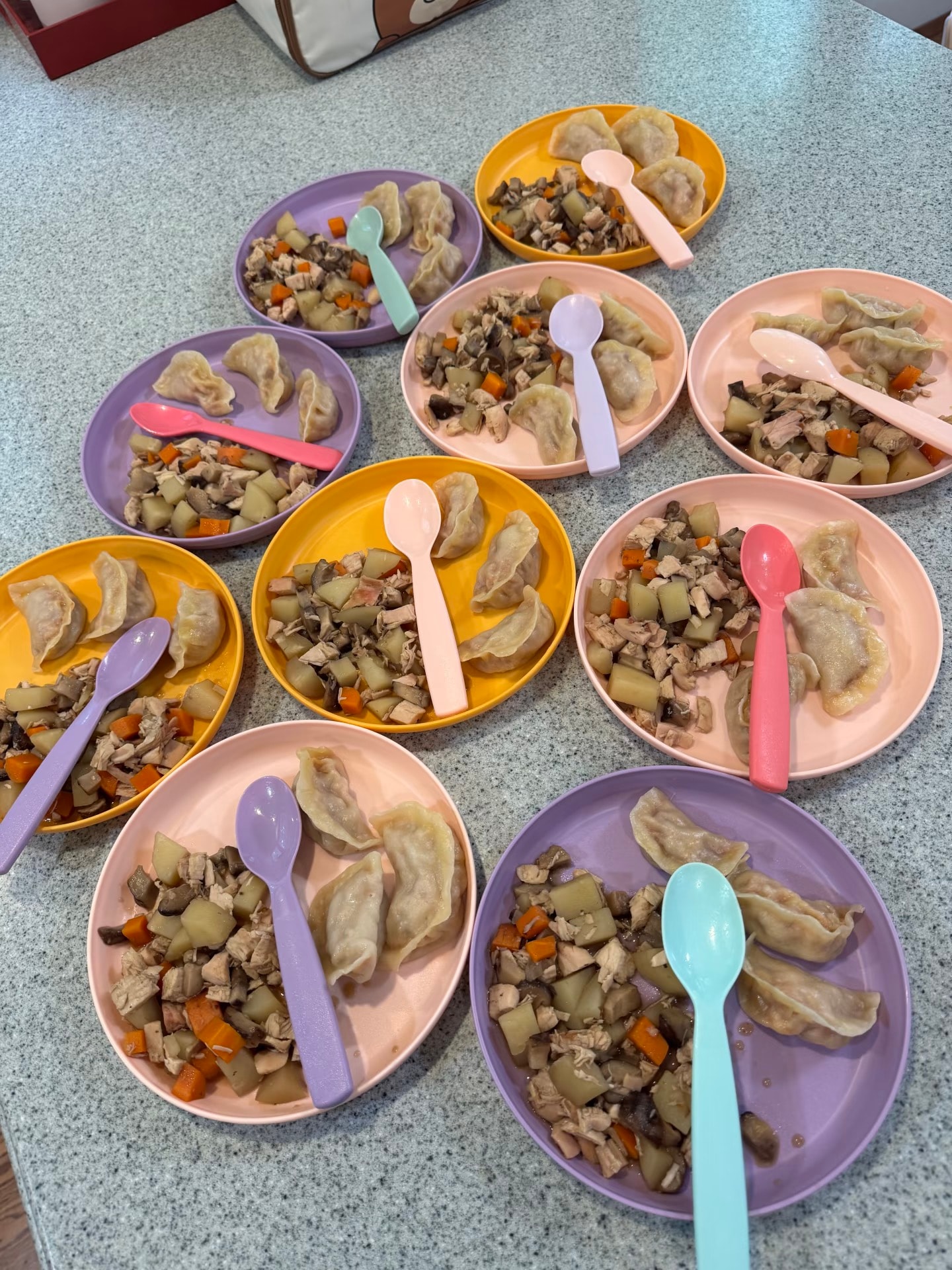 Panda Bear Childcare — colorful plates dumplings meat vegetables balanced meal
